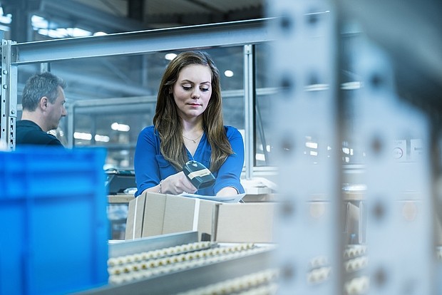 Employee carries out spare parts management